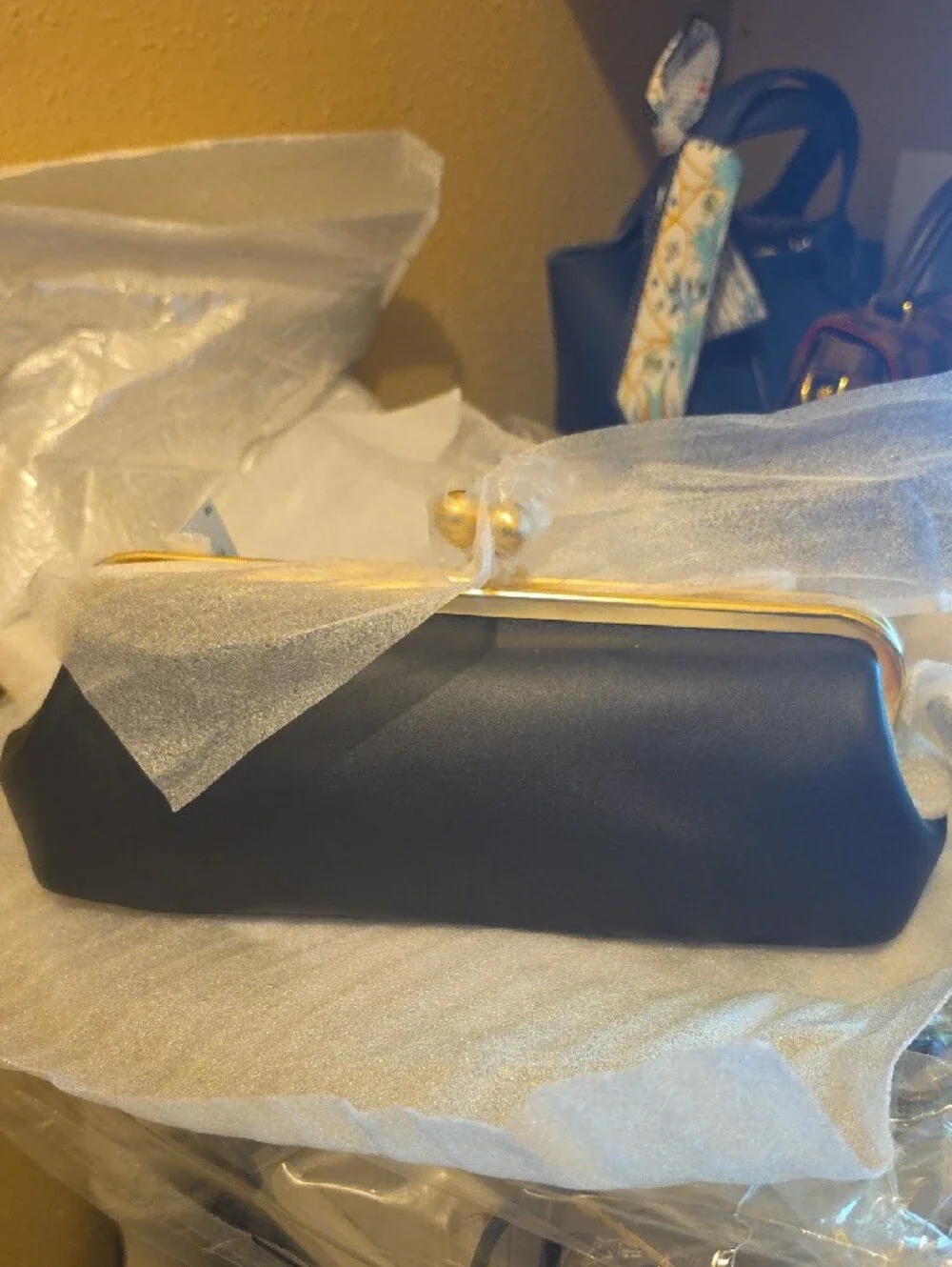 Coach Black Clutch with Gold Frame